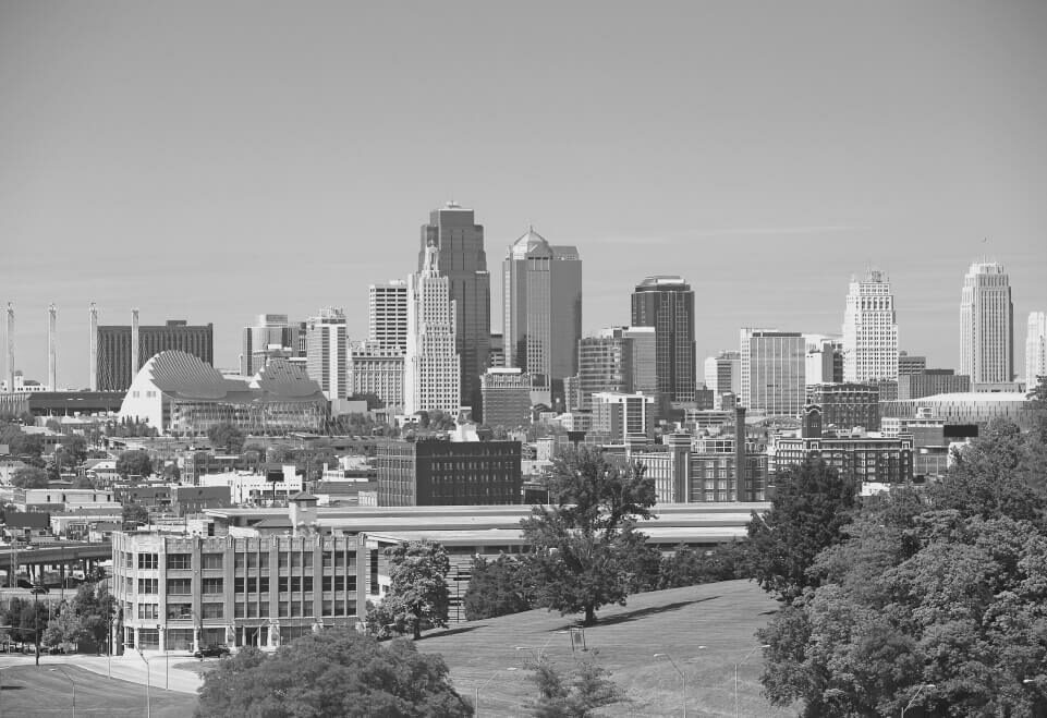 A black and white photograph depicting the essence of Missouri, capturing its unique landmarks and natural beauty.
