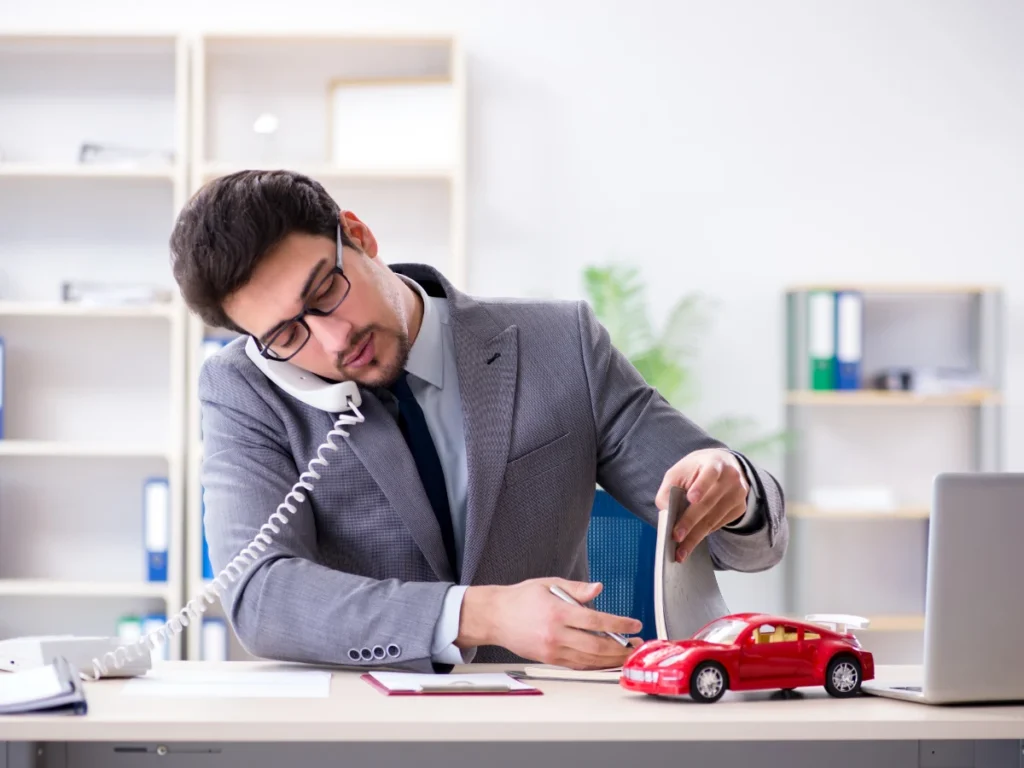 Man struggling with tasks without an insurance agent tool